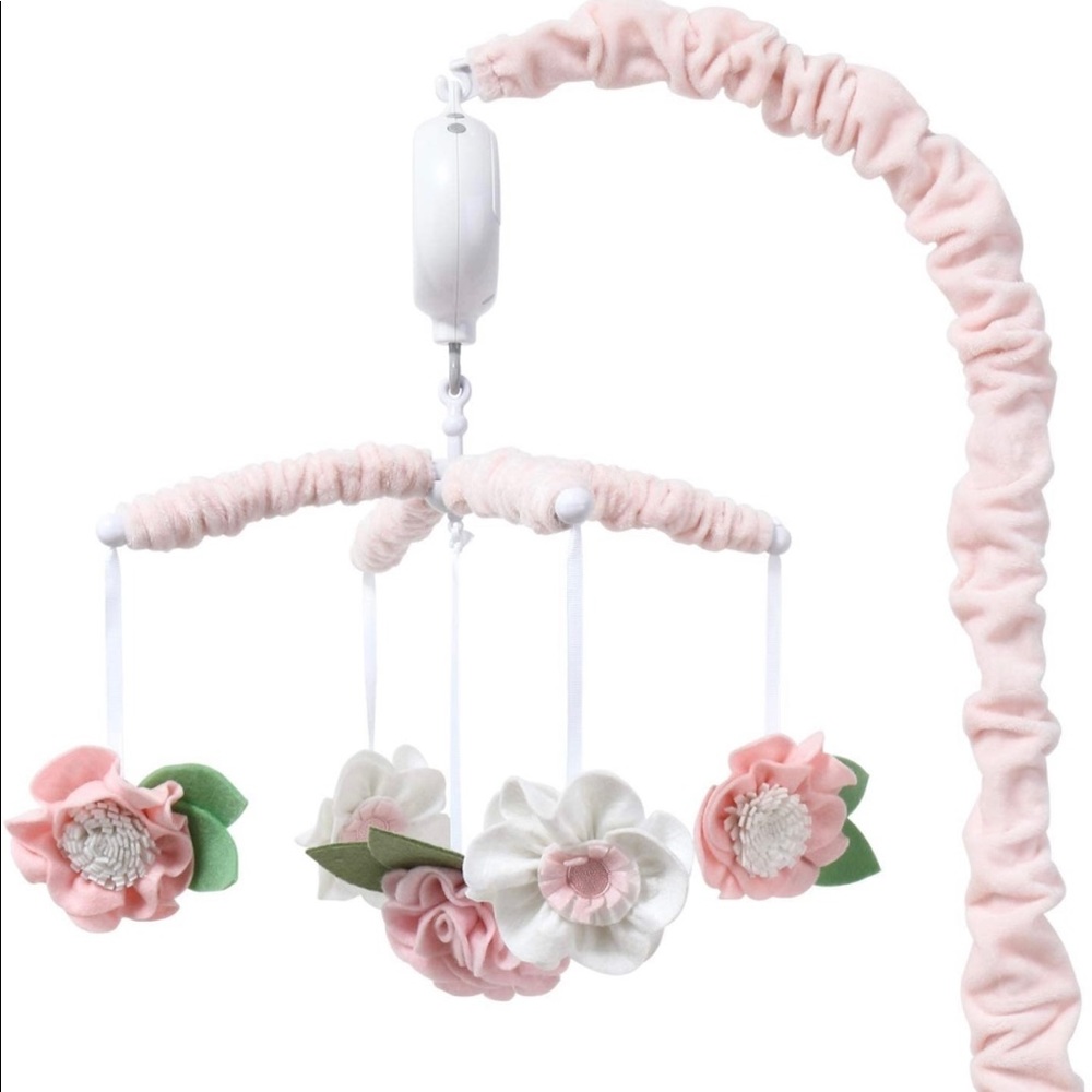 The peanut shell bedding and decor crib mobile.